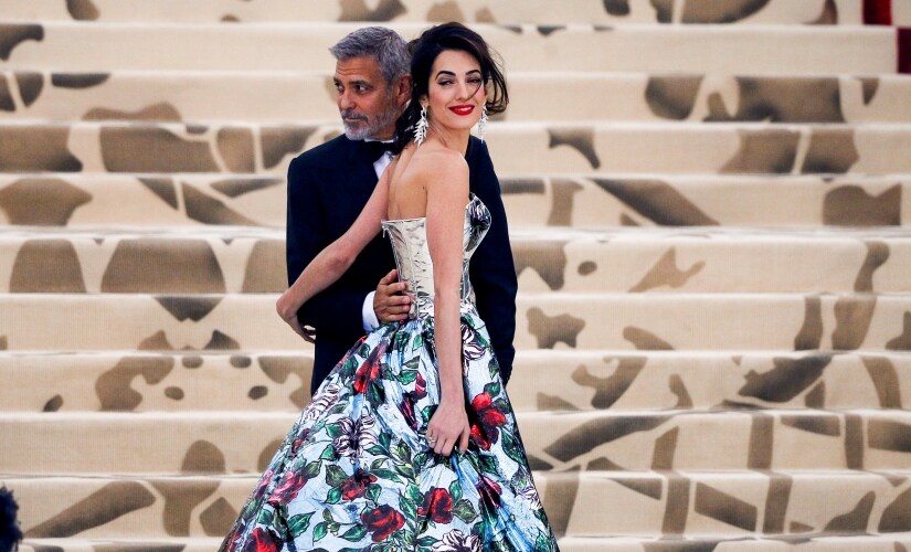 George and Amal Clooney. Reuters