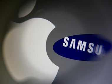 A Samsung logo and a logo of Apple are seen in an illustration. Image: Reuters