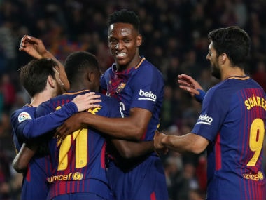 Barcelona's Ousmane Dembele celebrates with Lionel Messi, Yerry Mina and Luis Suarez after scoring their fifth goal. Reuters