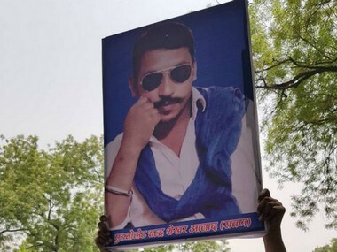 A playcard with image of Dalit leader Chandrasekhar Azad Ravan. News18