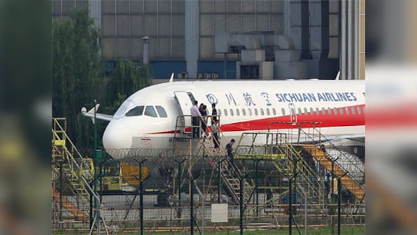 Co-pilot sucked halfway out of Sichuan Airlines' aircraft after cockpit window breaks at 32,000 feet over China