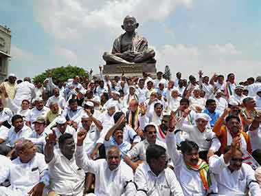 Governor Vajubhai Vala administers oath to BS Yeddyurappa; Congress, JD(S) claim democracy murdered in Karnataka Governor Vajubhai Vala administers oath to BS Yeddyurappa; Congress, JD(S) claim democracy murdered in Karnataka