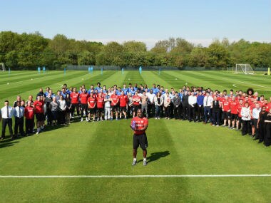 West Brom caretaker manager Darren Moore poses with the staff members after receiving the award. Twitter: @WBA