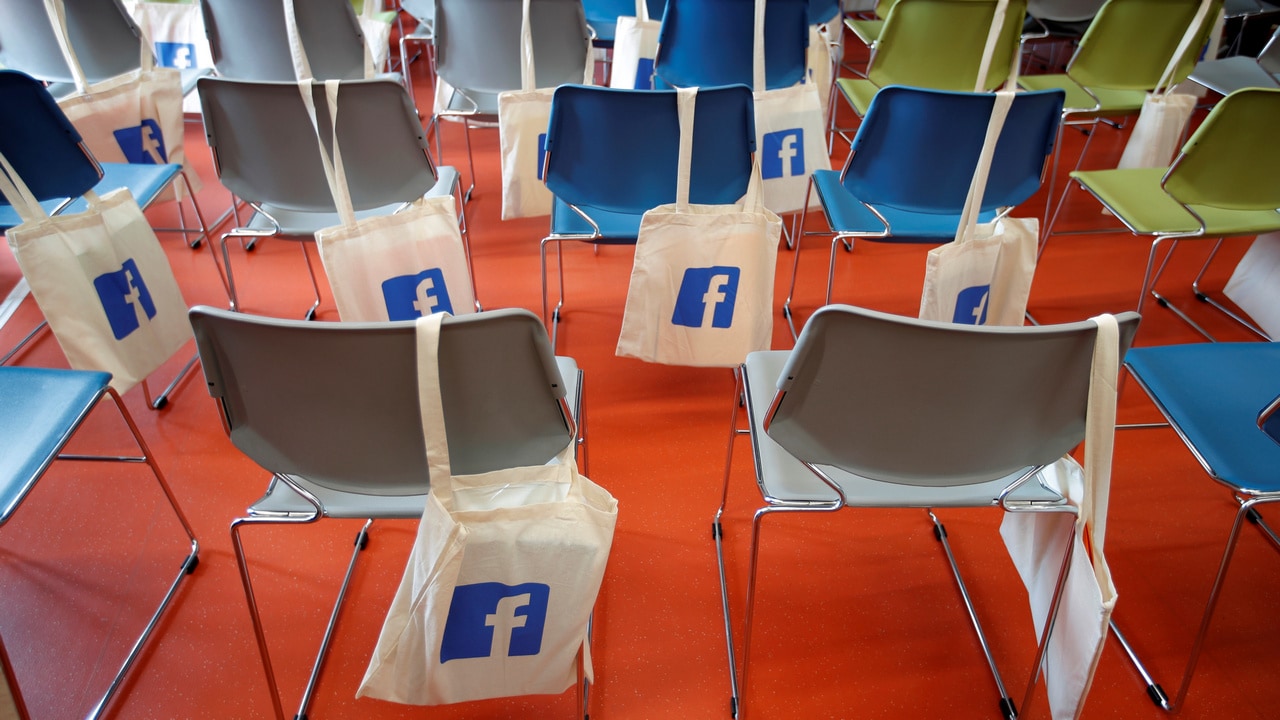 Bags with the Facebook logo are seen before a content summit at France's Facebook headquarters. Image: Reuters