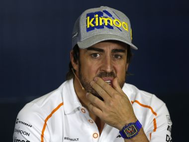 Fernando Alonso gestures during a media conversation. AP