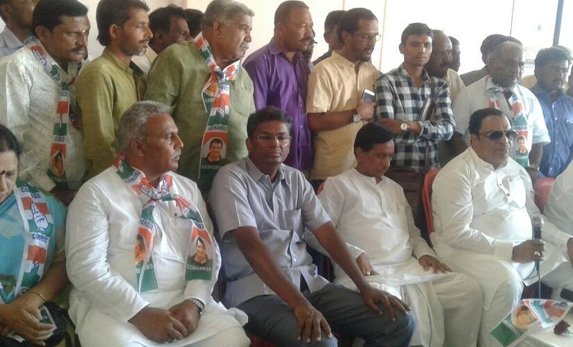 Former Union minister CM Ibrahim (extreme right) addresses party workers in Badami. Firstpost/Tamanna Naseer