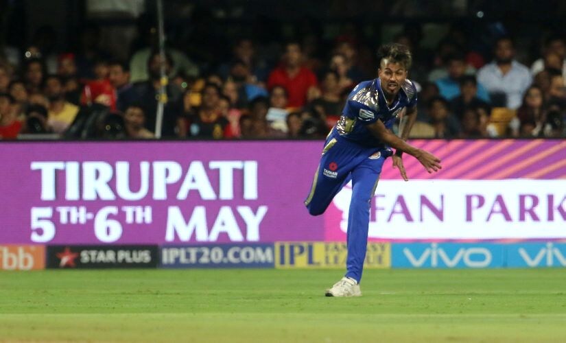 Hardik Pandya throws the ball to run out Brendon McCullum. SPORTZPICS