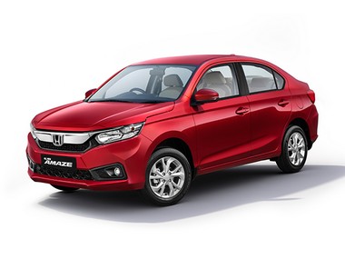 Honda Amaze launched with revamped design starting at Rs 5.59 lakh; to take on Swift Dzire, Tata Tiago and others Honda Amaze launched with revamped design starting at Rs 5.59 lakh; to take on Swift Dzire, Tata Tiago and others
