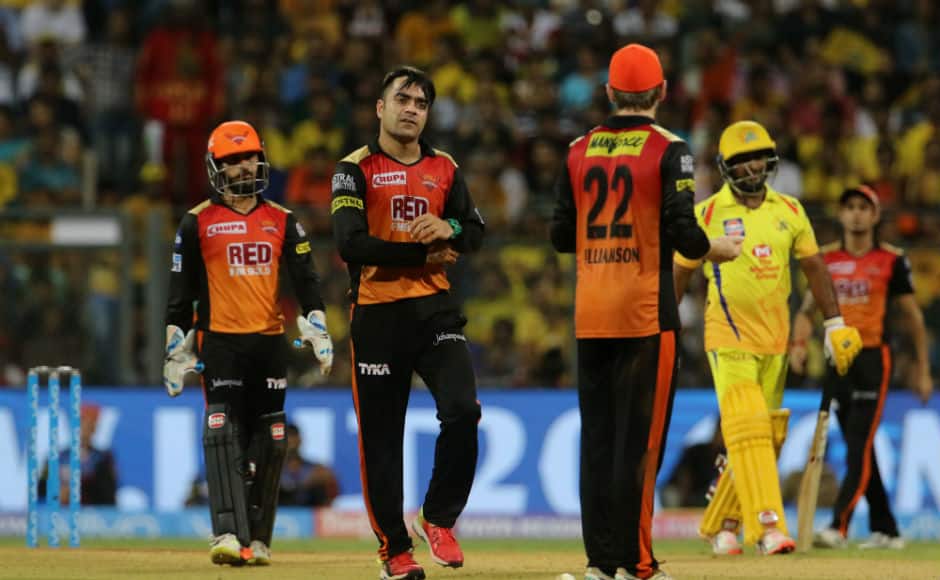 Sunrisers Hyderabad's spinner Rashid Khan has a brief chat with captain Kane Williamson as his side struggles to pick up a wicket. Sportzpics