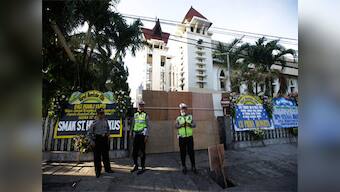 Family of six that bombed three churches in Indonesia's Surabaya well off, friendly with Christian neighbour