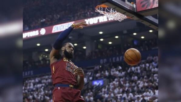 NBA Playoffs: LeBron James-led Cavaliers beat Raptors in overtime in Game 1; Warriors take 2-0 lead over Pelicans