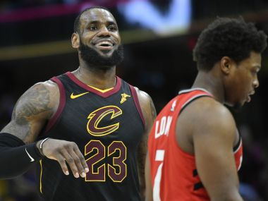 Cleveland Cavaliers' LeBron James reacts after scoring against the Raptors. Reuters