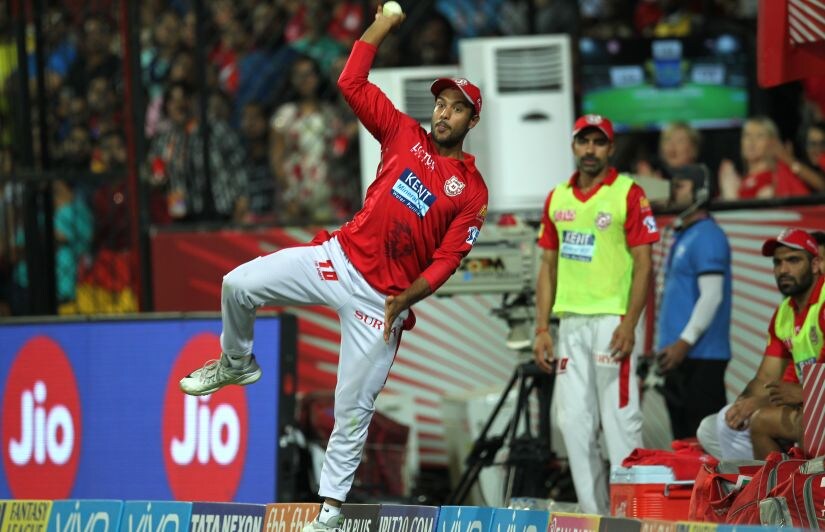 Mayank Agarwal of Kings XI Punjab catches the ball before throwing it to Manoj Tiwary to dismiss Ben Stokes. Sportzpics