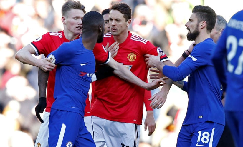 Manchester United's Scott McTominay intervenes as Nemanja Matic clashes with Chelsea's Antonio Rudiger. Reuters