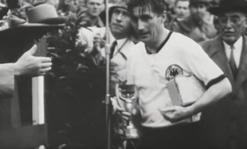 Germany captain Fritz Walter with the FIFA World Cup trophy after his team's 3-2 win over Hungary in the 1954 FIFA World Cup final. Screenshot of official FIFA video
