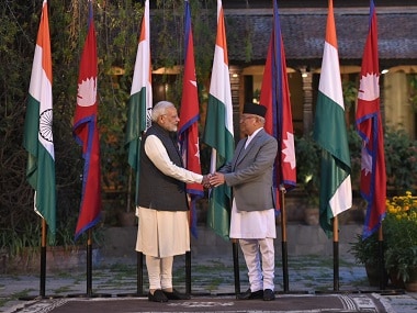 Prime Minister Narendra Modi with Nepal's prime minister KP Oli. Twitter @narendramodi
