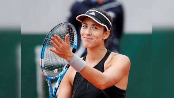 French Open 2018: Former champion Garbine Mugurza makes second round; teen Denis Shapovalov wins on debut