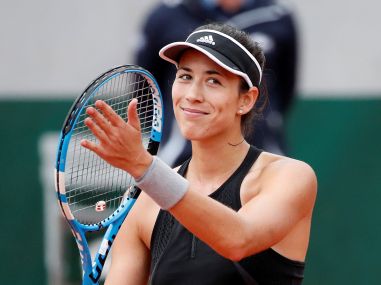 French Open 2018: Former champion Garbine Mugurza makes second round; teen Denis Shapovalov wins on debut French Open 2018: Former champion Garbine Mugurza makes second round; teen Denis Shapovalov wins on debut