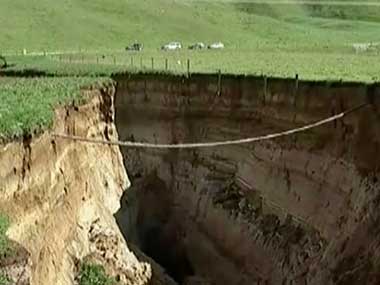 File image of the sinkhole on a farm in Rotorua, New Zealand. AP