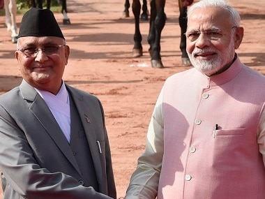 Prime Minister Narendra Modi with his Nepalese counterpart Khadga Prasad Oli. PTI