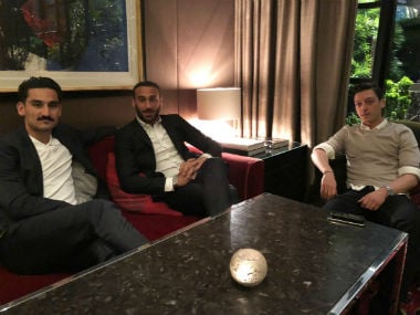 Mesut Ozil posing with Cenk Tosun and Ilkay Gundogan. Twitter: @MesutOzil1088