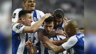 Primeira Liga: FC Porto seal first title in five seasons after rivals Benfica draw with Sporting Lisbon