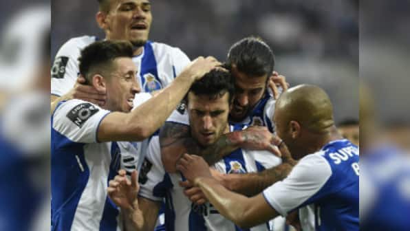 Primeira Liga: FC Porto seal first title in five seasons after rivals Benfica draw with Sporting Lisbon