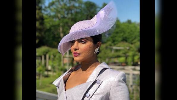 Prince Harry, Meghan Markle royal wedding: Priyanka Chopra stuns in chic Vivienne Westwood dress suit