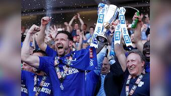 Cardiff City return to Premier League as manager Neil Warnock secures record eighth promotion
