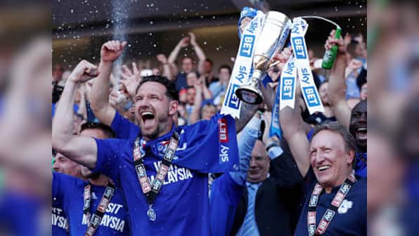 Cardiff City return to Premier League as manager Neil Warnock secures record eighth promotion