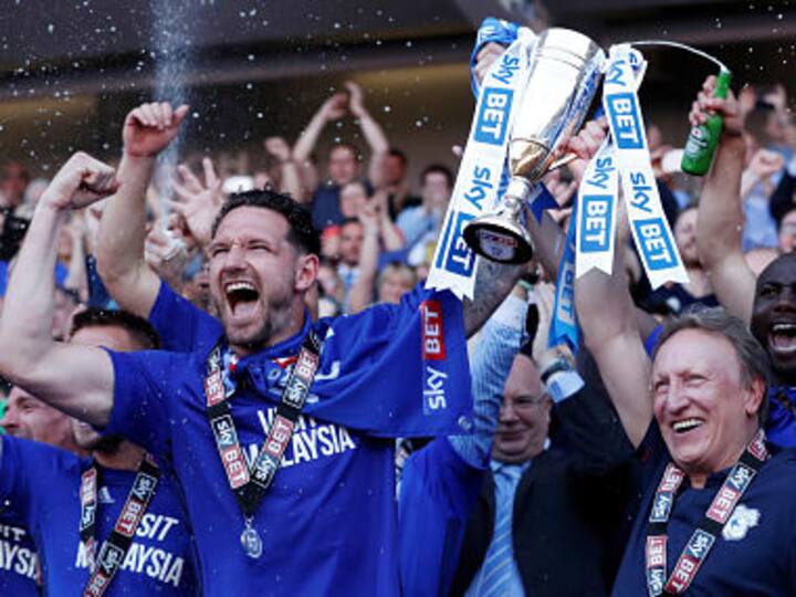 Cardiff City return to Premier League as manager Neil Warnock secures record eighth promotion