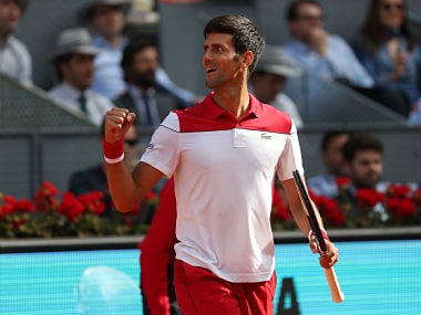 Tennis - ATP 1000 - Madrid Open - Madrid, Spain - May 7, 2018 Serbia's Novak Djokovic celebrates winning his first round match against Japan's Kei Nishikori REUTERS/Susana Vera - RC137AE8F9B0