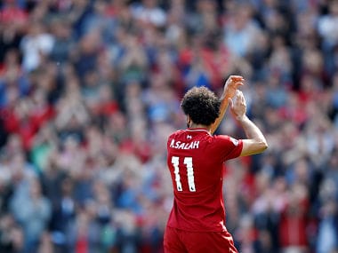 Soccer Football - Premier League - Liverpool vs Brighton & Hove Albion - Anfield, Liverpool, Britain - May 13, 2018 Liverpool's Mohamed Salah applauds fans as he is substituted Action Images via Reuters/Carl Recine EDITORIAL USE ONLY. No use with unauthorized audio, video, data, fixture lists, club/league logos or "live" services. Online in-match use limited to 75 images, no video emulation. No use in betting, games or single club/league/player publications. Please contact your account representative for further details. - RC17BD641230