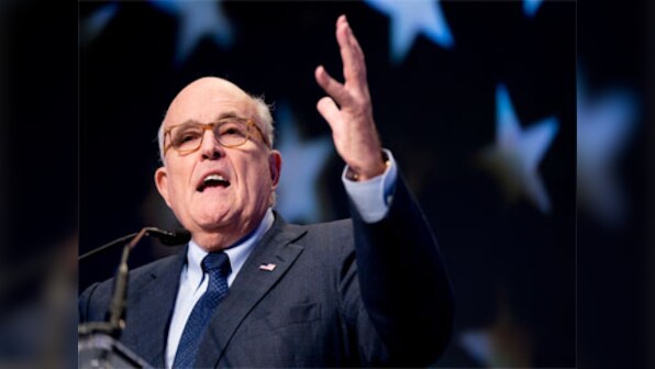 Donald Trump's new attorney Rudy Giuliani delivers contradictory statements as he struggles to defend US president
