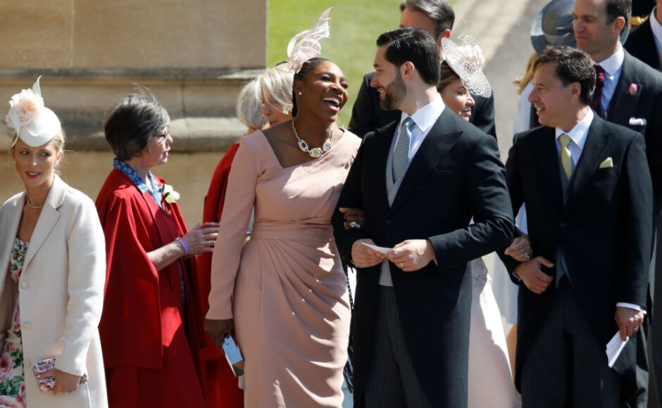 Meghan Markle's friend, US tennis player Serena Williams and her husband US entrepreneur Alexis Ohanian arrive for the wedding ceremony. Reuters