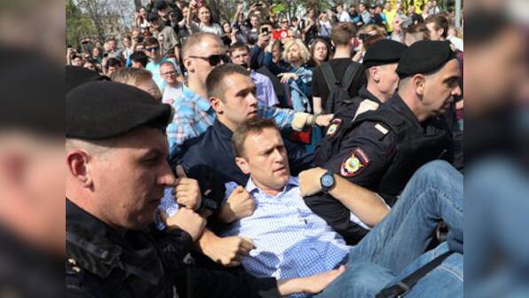 Nearly 1,600, including Alexei Navalny, arrested in anti-Vladimir Putin protests across Russia