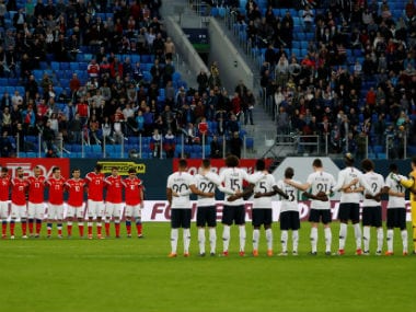 Russia and France players during a minutes silence before the match. Reuters