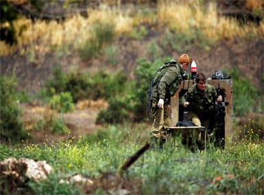 Israeli soldiers near the Israeli side of the border with Syria in the Israeli-occupied Golan Heights. Reuters