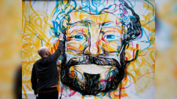 Champions League final: Local street artist paints 'Egyptian King' Mohamed Salah on Liverpool's city centre