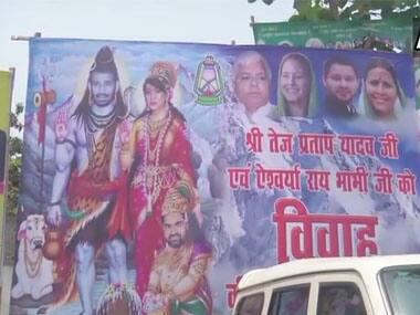 Day before wedding, poster outside Lalu Prasad Yadav's house shows Tej Pratap and wife Aishwarya Rai as Lord Shiva, Parvati