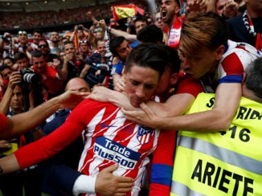 Atletico Madrid's Fernando Torres celebrates scoring his second goal. Reuters