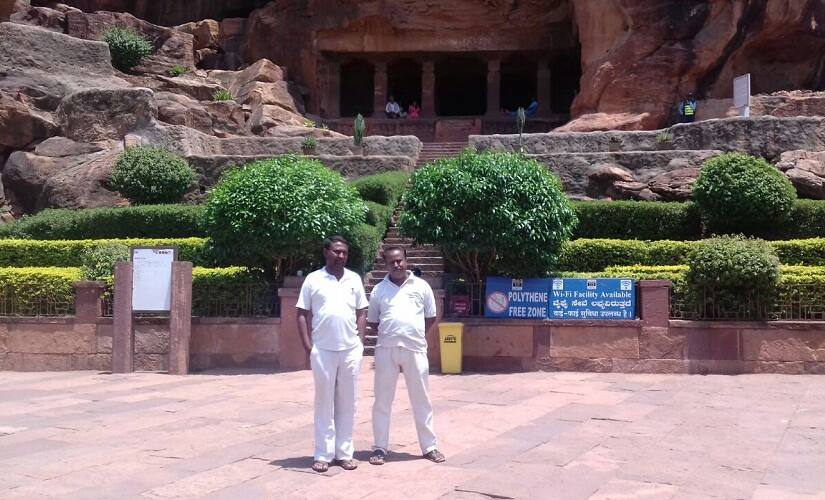 Tourist guides await customers outside Badami Caves. Firstpost/Tamanna Naseer