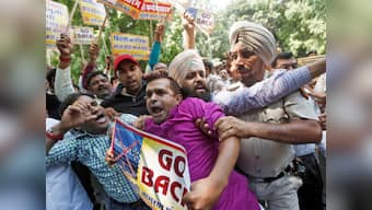 'Walmart Go Back': RSS' economic wing protests against US retail giant; wants Flipkart deal to be scrapped