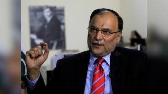 Pakistan interior minister Ahsan Iqbal survives assassination attempt at political rally, police arrests attacker