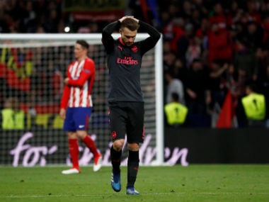 Arsenal's Aaron Ramsey looks dejected after their exit from the Europa League semi-final at the hands of Atletico Madrid. Reuters