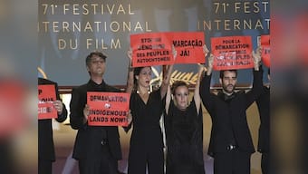 Cannes 2018: Cast, crew members of Brazilian film hold up placards to protest against 'genocide' of native people