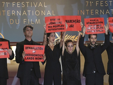 Cannes 2018: Cast, crew members of Brazilian film hold up placards to protest against 'genocide' of native people Cannes 2018: Cast, crew members of Brazilian film hold up placards to protest against 'genocide' of native people