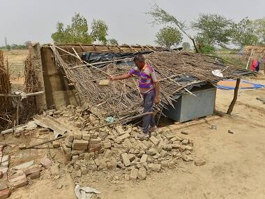 Houses were damaged in the massive storm. PTI