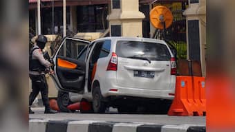 Sword-wielding men attack Riau police headquarters in Indonesia, killing one officer; 4 assailants shot dead, 1 arrested