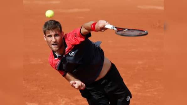 Munich Open: Former champion Martin Klizan rallies to defeat Florian Mayer to progress to second round